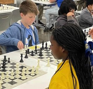 WSA student playing chess