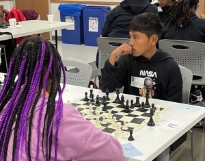 WSA student playing chess